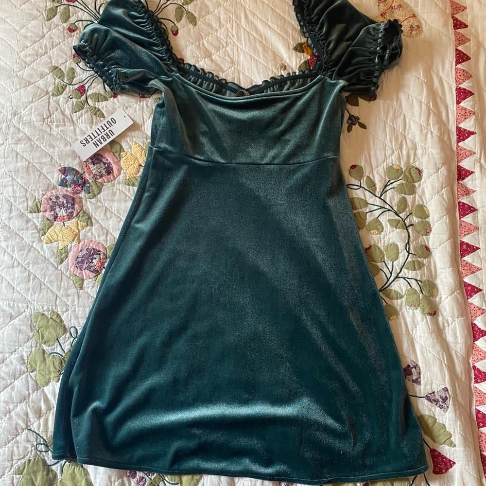 Green velvet mini dress with puff sleeves
